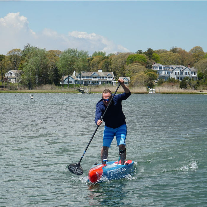 coach jonathan demonstrating the paddle stroke set up