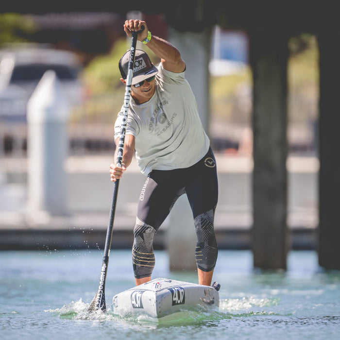 Danny Ching paddling his 404 with a hippo stick