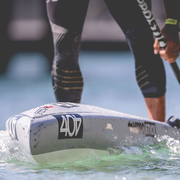 Danny Ching paddling his 404 with a hippo stick paddle