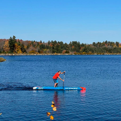 head coach jonathan bischof showcasing performance paddleboard technique